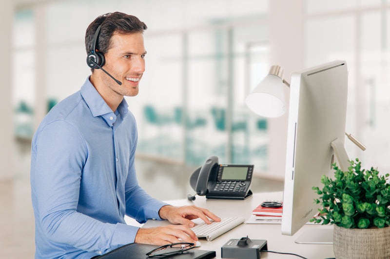 Man researching what DECT technology is and why we use it
