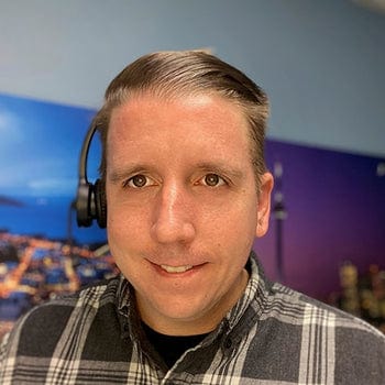 Chris wearing a Leitner LH270 wireless phone and computer headset