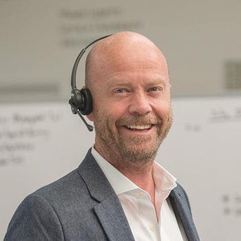 Mike wearing a Leitner LH270 wireless phone and computer headset at work