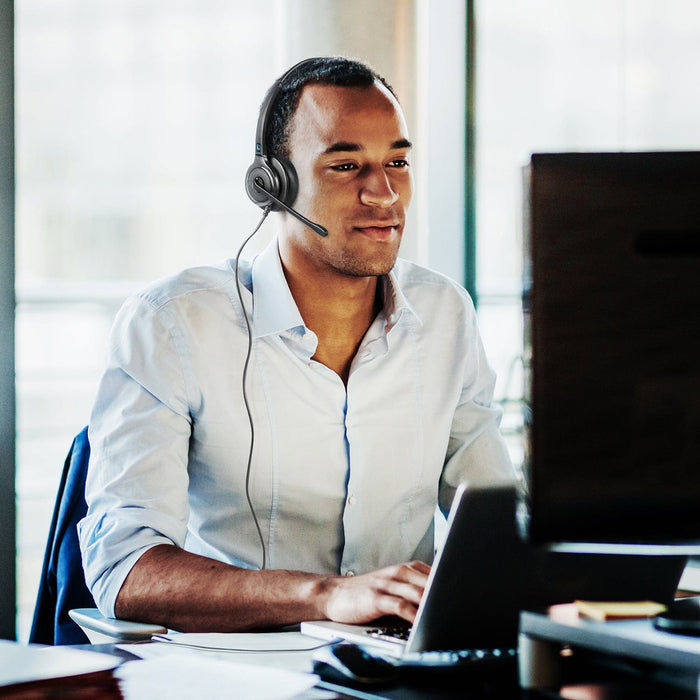 Man working with a Leitner Wired LH240XL headset